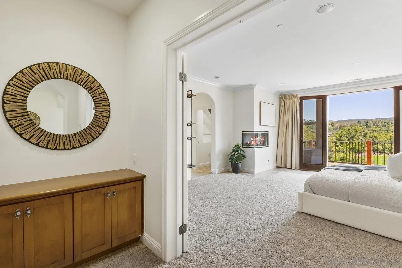 20919 Questhaven Road San Marcos, CA 92078 - Photo 27 of 54 a view of a livingroom with a couch and a large window