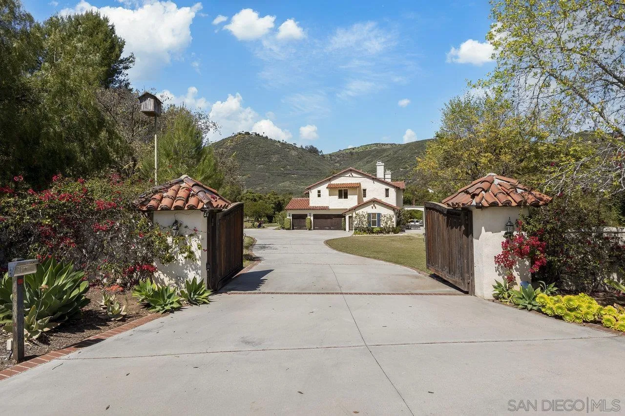 20919 Questhaven Road San Marcos, CA 92078 - Photo 5 of 54 a view of a street with houses
