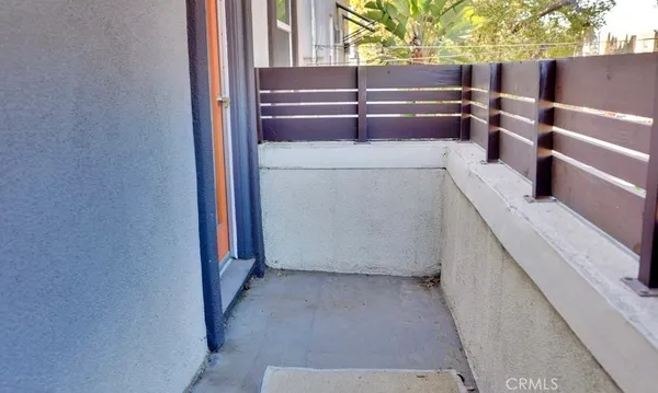 a view of storage and utility room with stairs