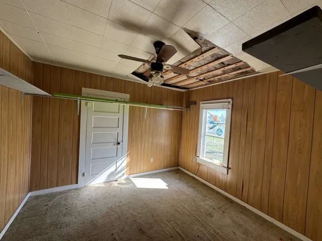 a view of empty room with windows
