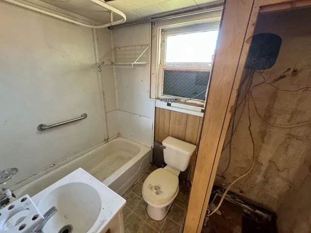 a bathroom with a sink and a toilet