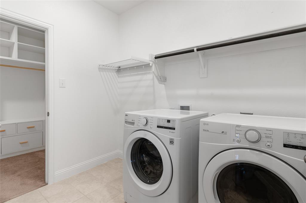 4117 Mockingbird Lane Melissa, TX 75454 - Photo 11 of 24 a utility room with dryer and washer