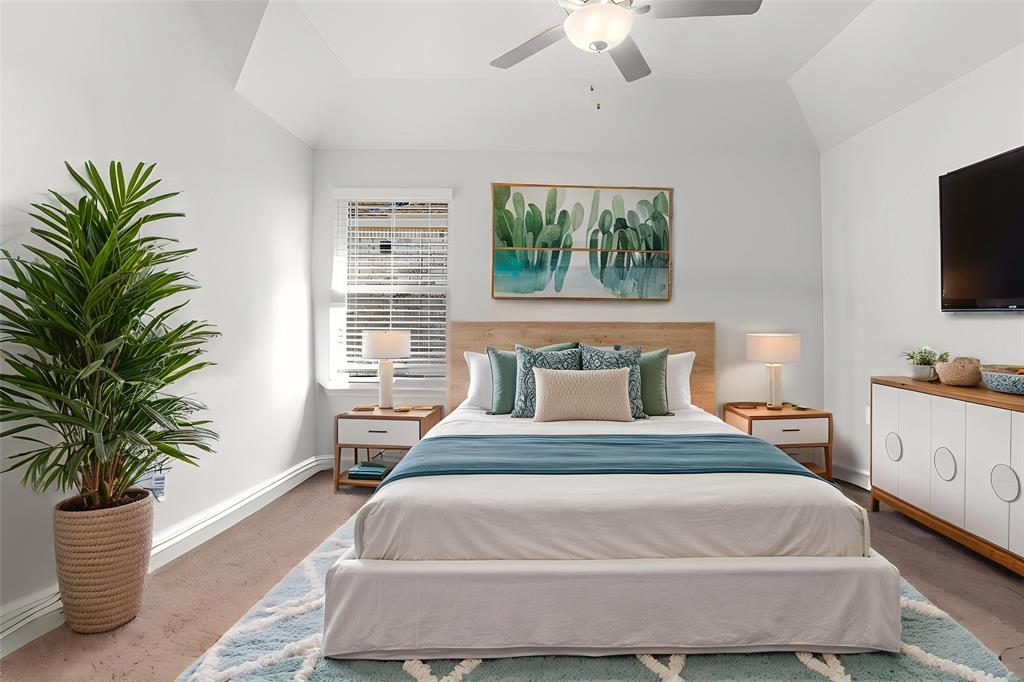 4117 Mockingbird Lane Melissa, TX 75454 - Photo 13 of 24 a bedroom with a bed and a potted plant