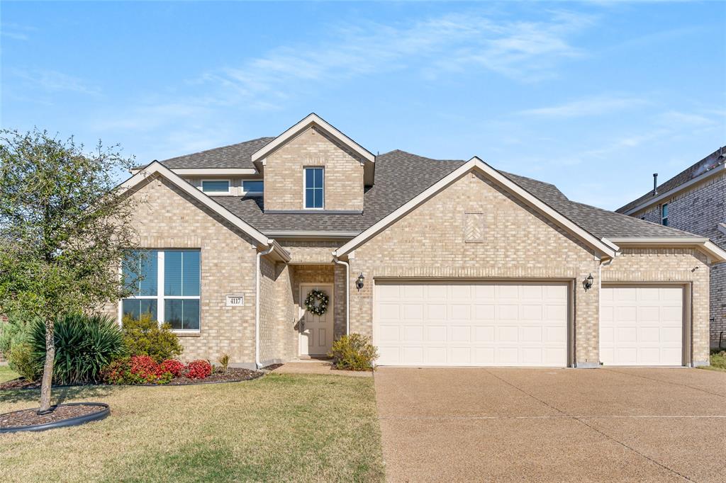 4117 Mockingbird Lane Melissa, TX 75454 - Photo 2 of 24 a front view of a house with garden