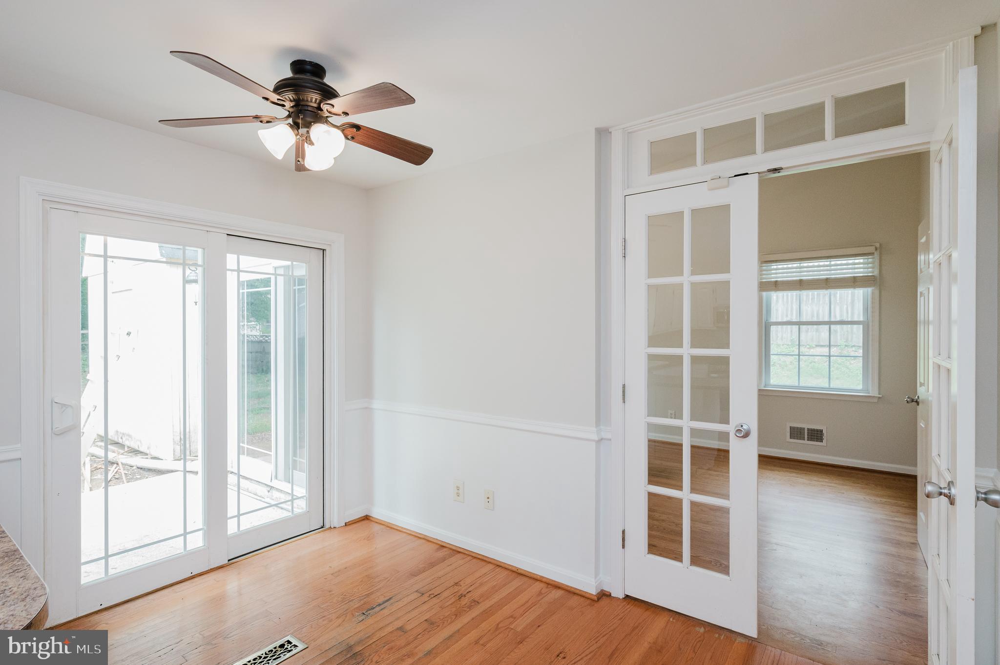 4 Old Spring Court Cockeysville, MD 21030 - Photo 15 of 53 an empty room with wooden floor closet and windows