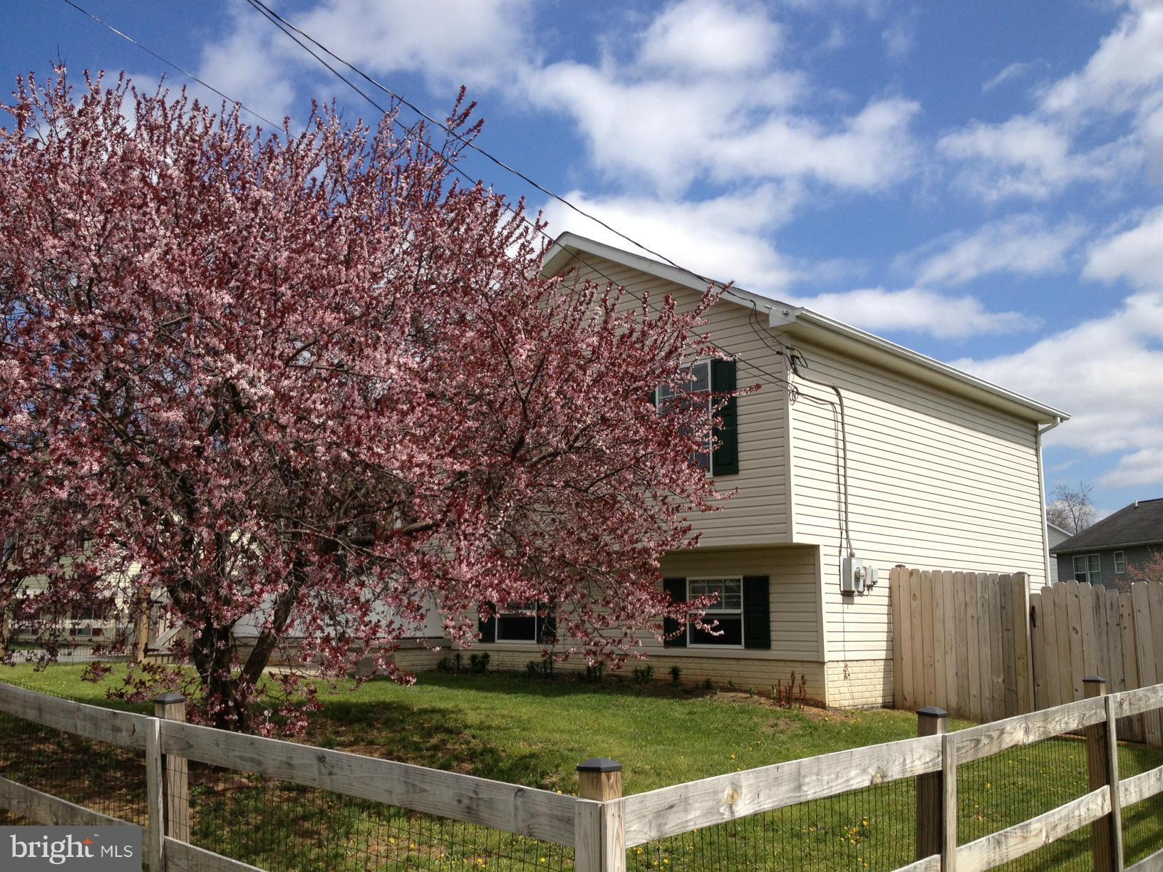 412 East 10th Avenue Ranson, WV 25438 - Photo 2 of 27 a view of a house with a yard
