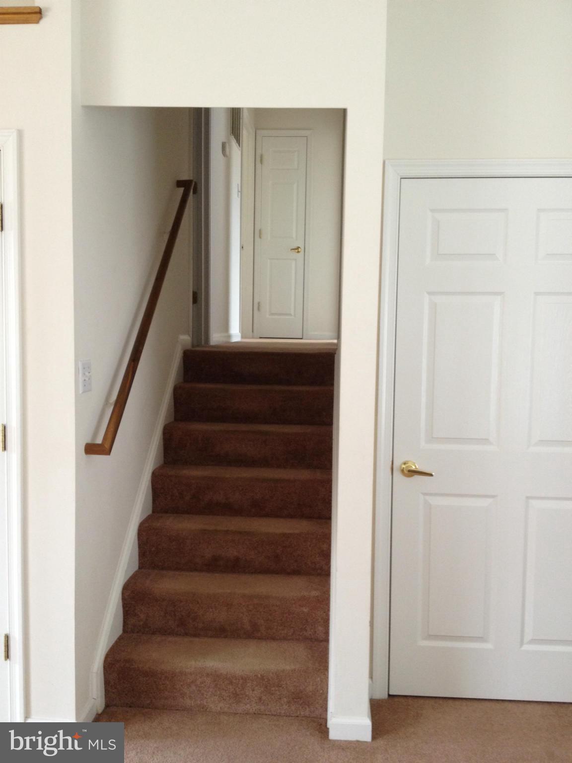 412 East 10th Avenue Ranson, WV 25438 - Photo 11 of 27 a view of entryway with wooden floor