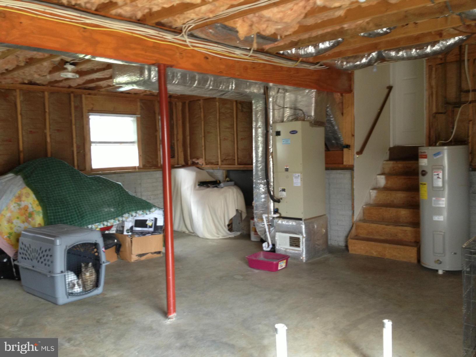 412 East 10th Avenue Ranson, WV 25438 - Photo 21 of 27 a view of a room with gym equipment