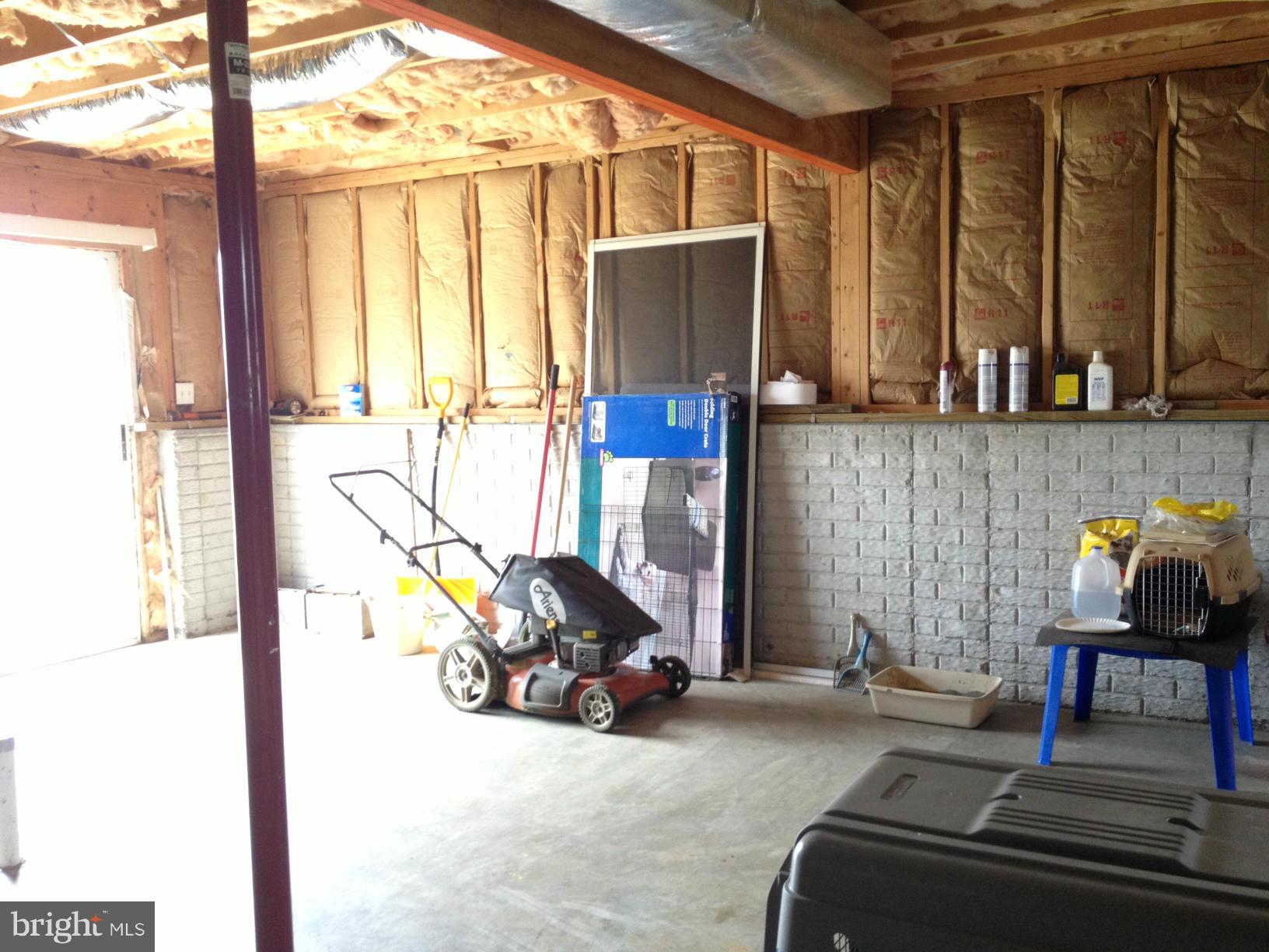 412 East 10th Avenue Ranson, WV 25438 - Photo 22 of 27 a view of a room with gym equipment