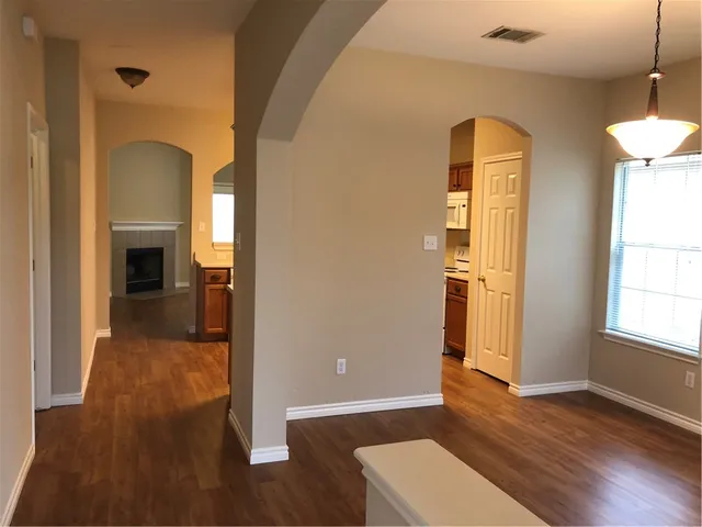 a view of livingroom with furniture and wooden floor