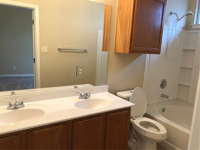 a bathroom with a sink and a toilet
