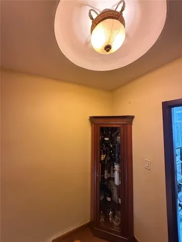 a view of a livingroom with furniture and staircase