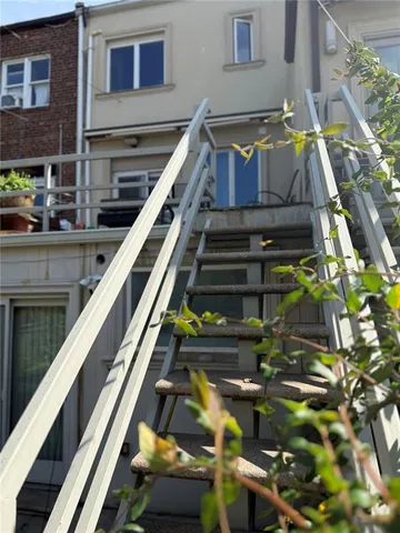 a front view of a house with parking space