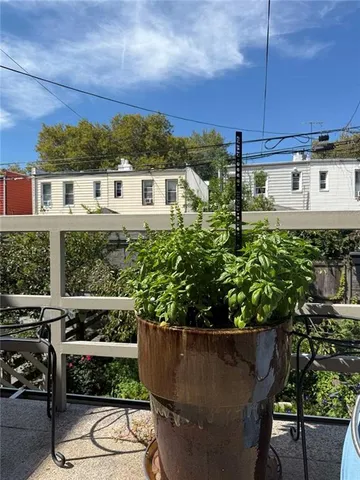 a city street lined with buildings and cars