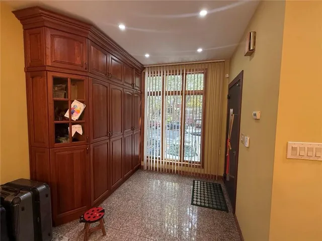 a view of entryway with wooden floor