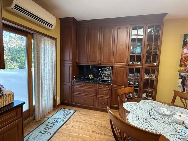 a bed room with a bed furniture and a window