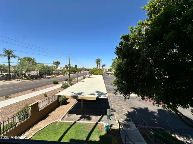 a view of an empty room and a window