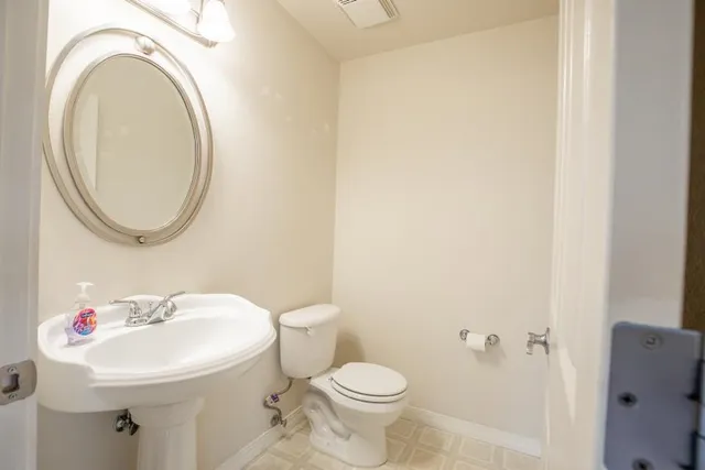 a view of a room that has a window in it