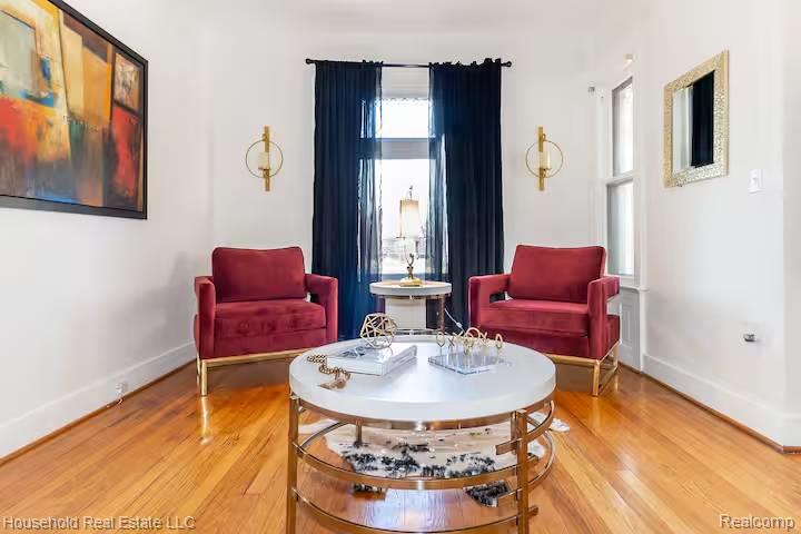 4446 Commonwealth Street Detroit, MI 48208 - Photo 3 of 28 Living area featuring light wood finished floors