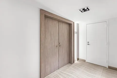 a view of a livingroom with wooden floor