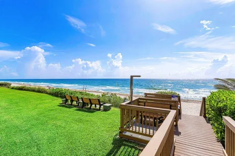 a view of a chairs and table on the terrace