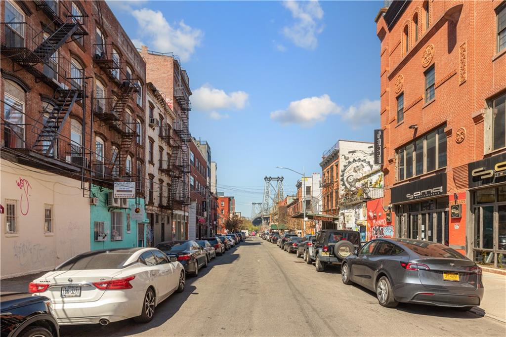 264 Berry Street Brooklyn, NY 11249 - Photo 15 of 21 a car parked in front of a buildings