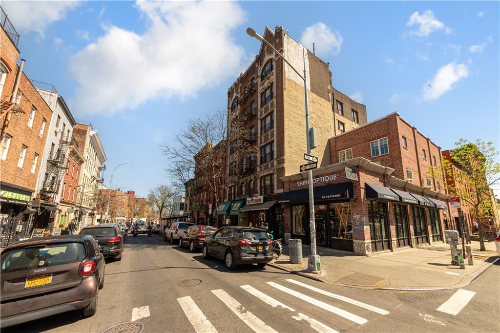 264 Berry Street Brooklyn, NY 11249 - Photo 16 of 21 a view of a street with cars