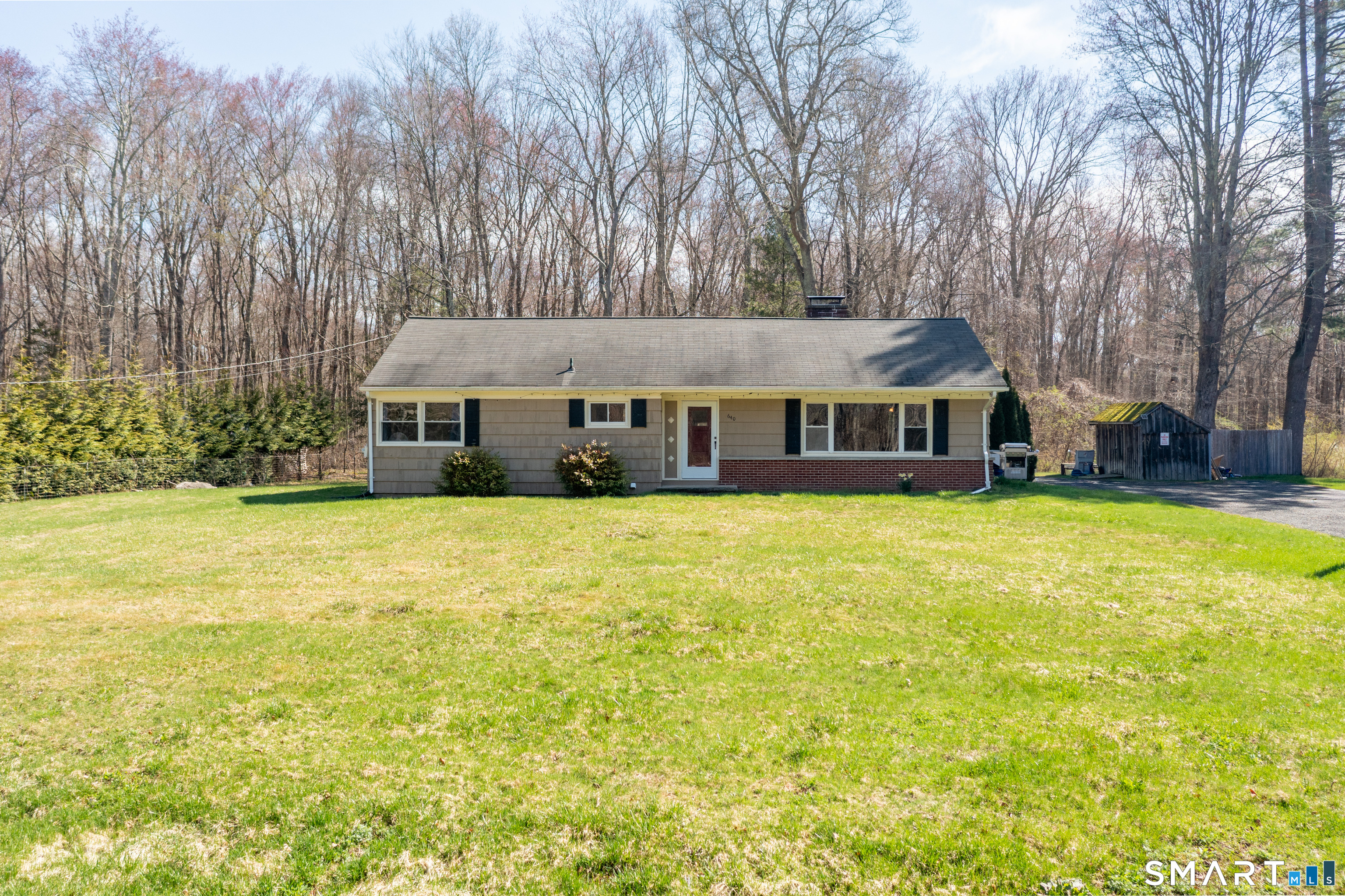 640 Wolf Den Road Brooklyn, CT 06234 - Photo 1 of 1 a view of house with a swimming pool