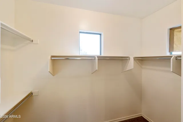 a view of a room with racks on the wall