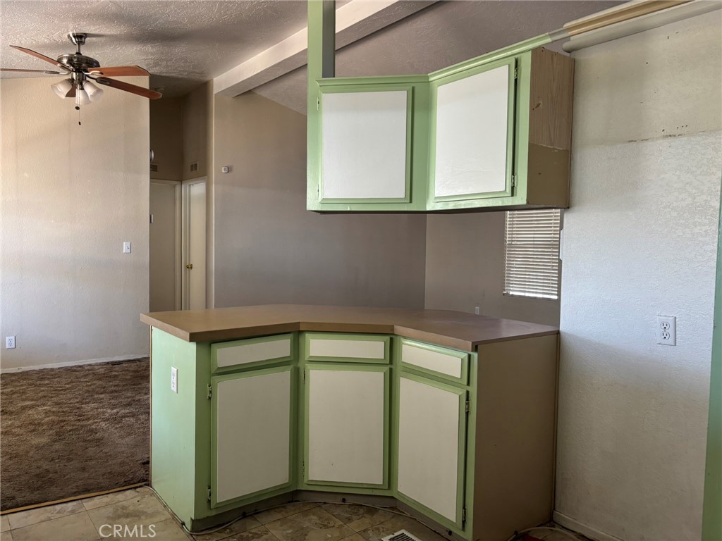 20843 Waalew Road, Unit C4 Apple Valley, CA 92307 - Photo 13 of 38 a bathroom with a sink and a mirror