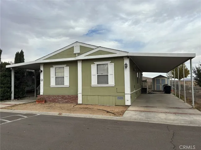 a front view of a house with a garage