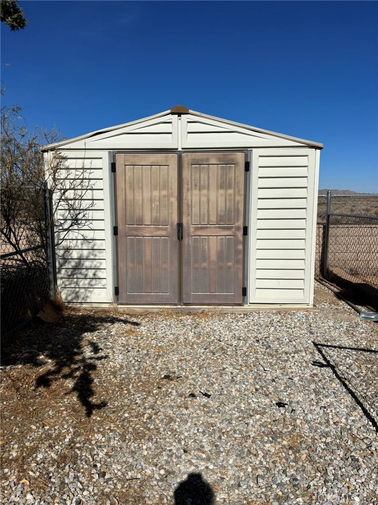 20843 Waalew Road, Unit C4 Apple Valley, CA 92307 - Photo 27 of 38 a front view of a house