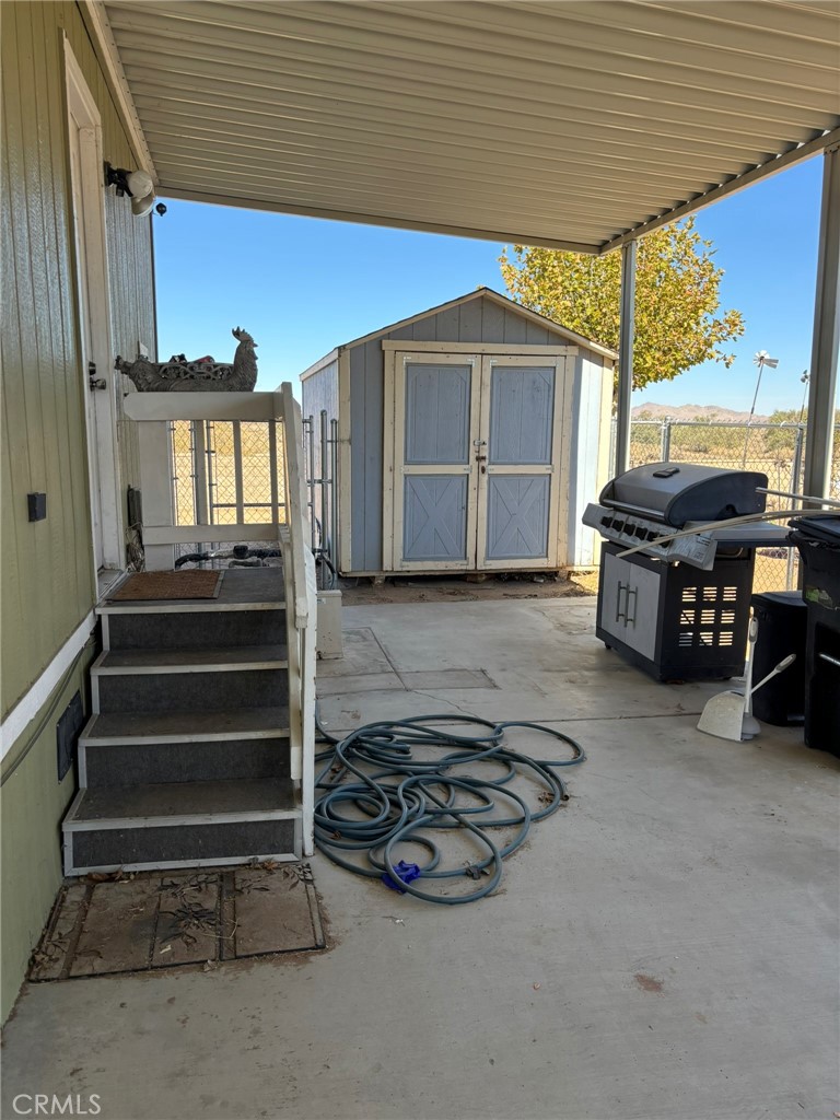 20843 Waalew Road, Unit C4 Apple Valley, CA 92307 - Photo 31 of 38 a view of a car park in front of house