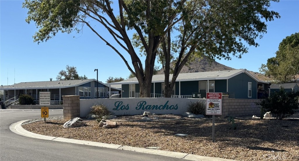 20843 Waalew Road, Unit C4 Apple Valley, CA 92307 - Photo 33 of 38 a front view of a house with entertaining space