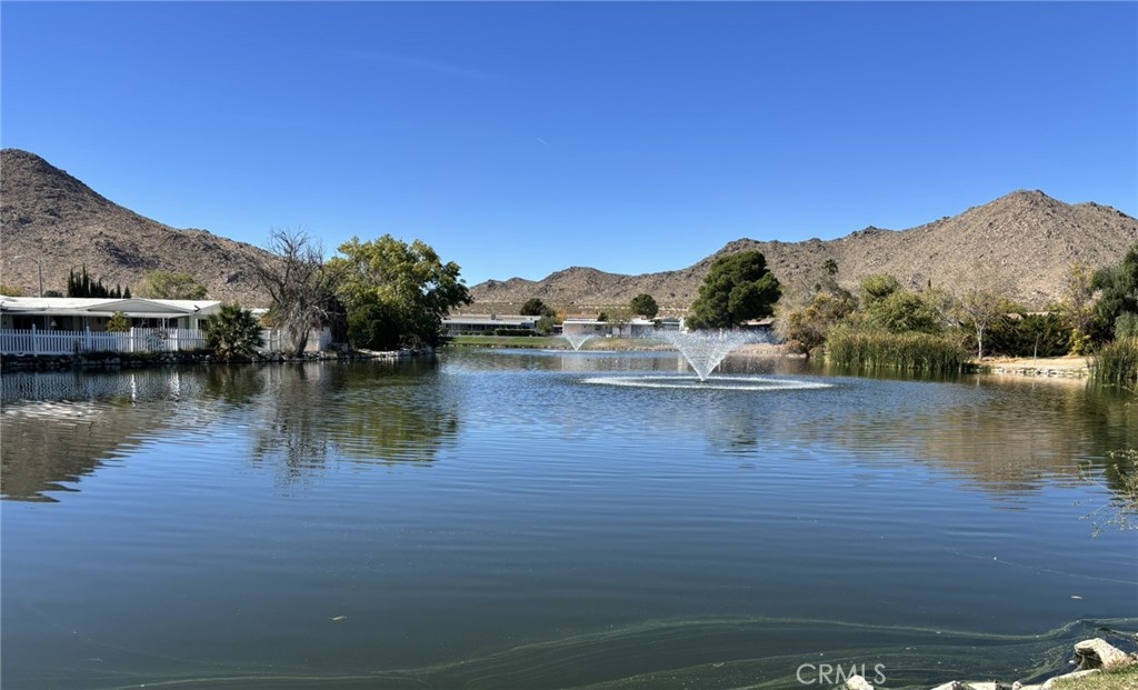 20843 Waalew Road, Unit C4 Apple Valley, CA 92307 - Photo 37 of 38 a view of lake with mountain