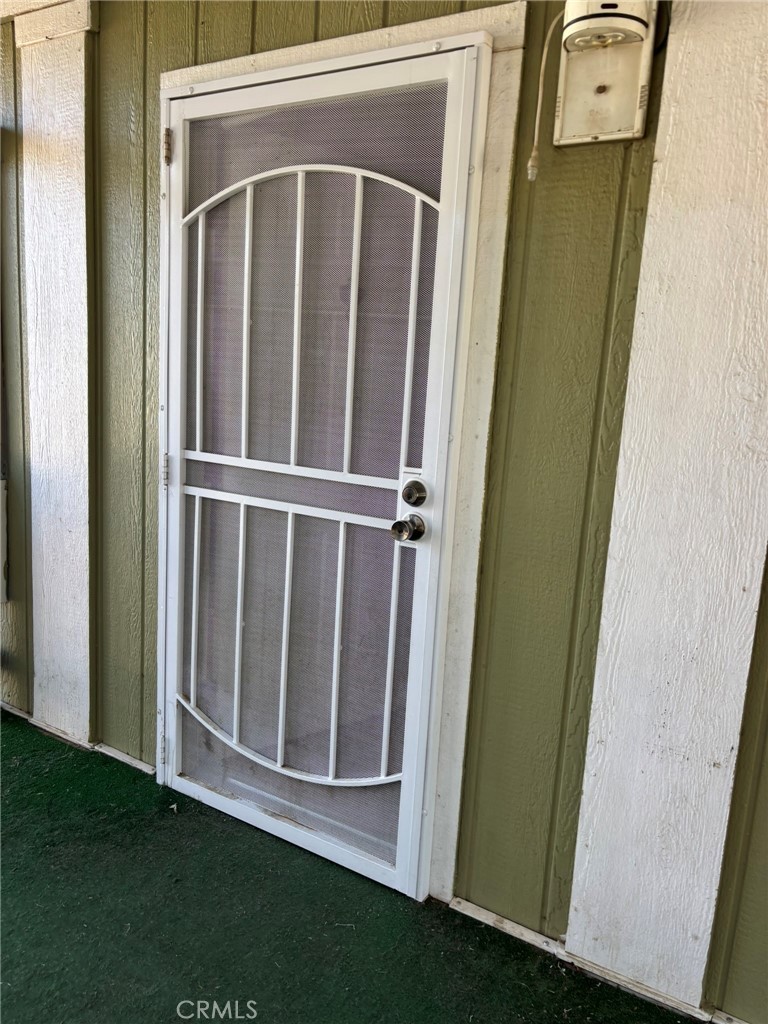 20843 Waalew Road, Unit C4 Apple Valley, CA 92307 - Photo 5 of 38 a view of front door