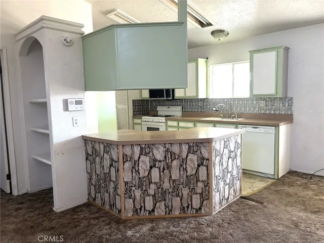 a bathroom with a sink a mirror and a bathtub