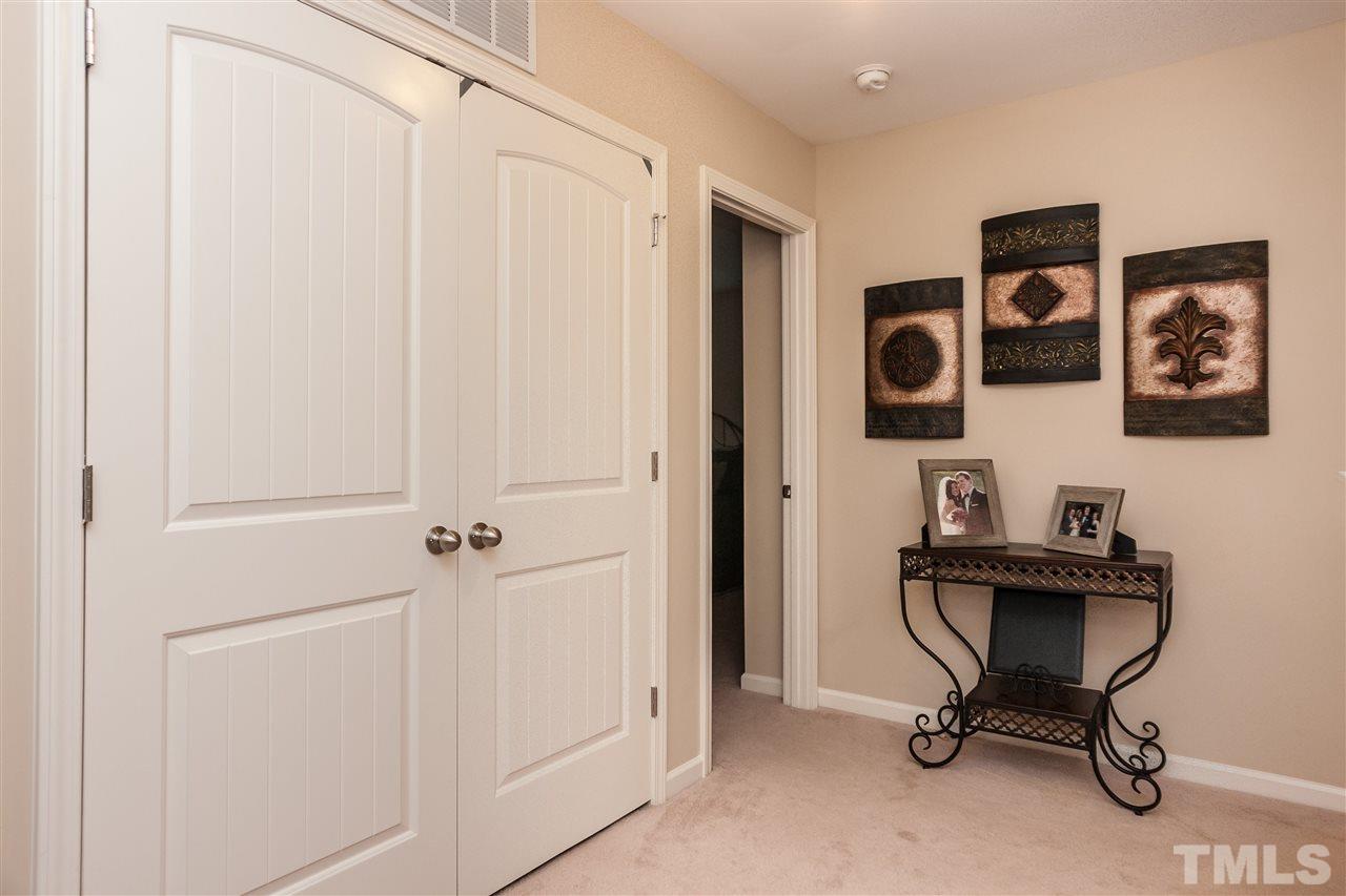 1306 Still Monument Way Raleigh, NC 27603 - Photo 10 of 25 a view of a workspace with furniture and a window