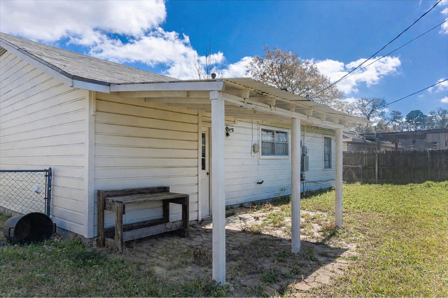 665 Parsons Drive Beaumont, TX 77706 - Photo 18 of 18 a view of a house with a yard