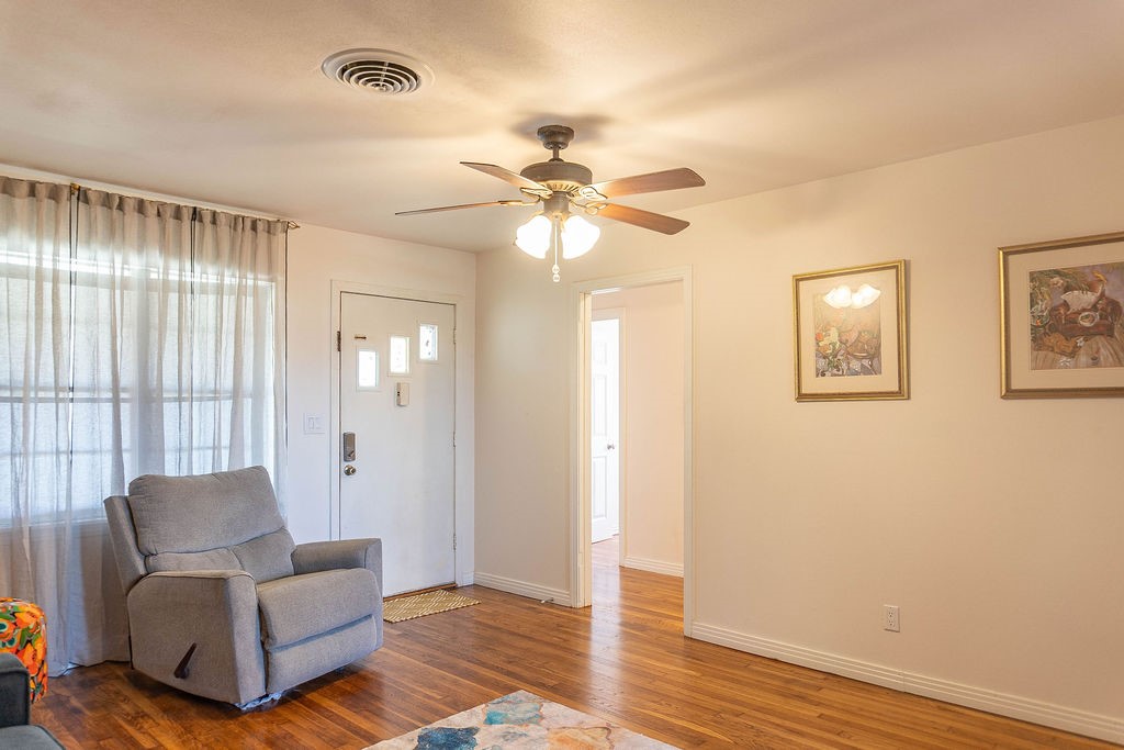 665 Parsons Drive Beaumont, TX 77706 - Photo 5 of 18 a living room with furniture and a ceiling fan