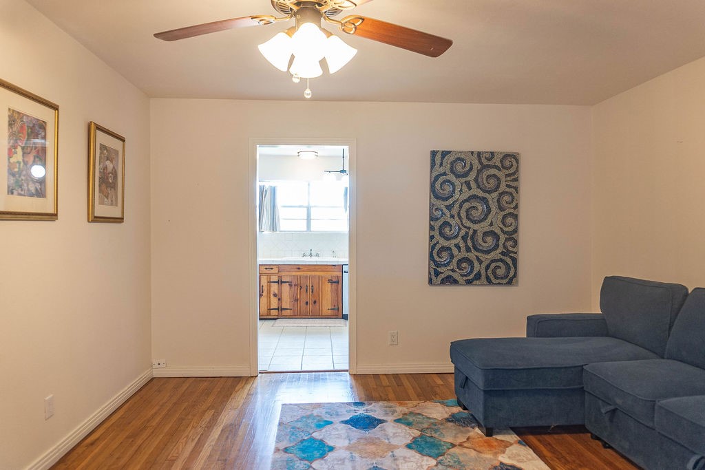 665 Parsons Drive Beaumont, TX 77706 - Photo 6 of 18 a living room with furniture and a rug