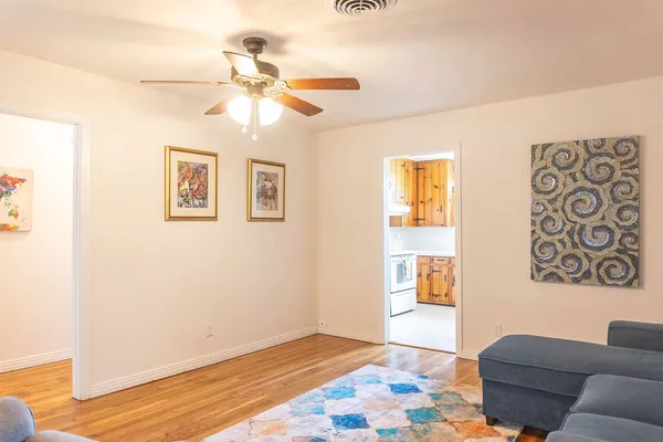 a living room with couch and a window