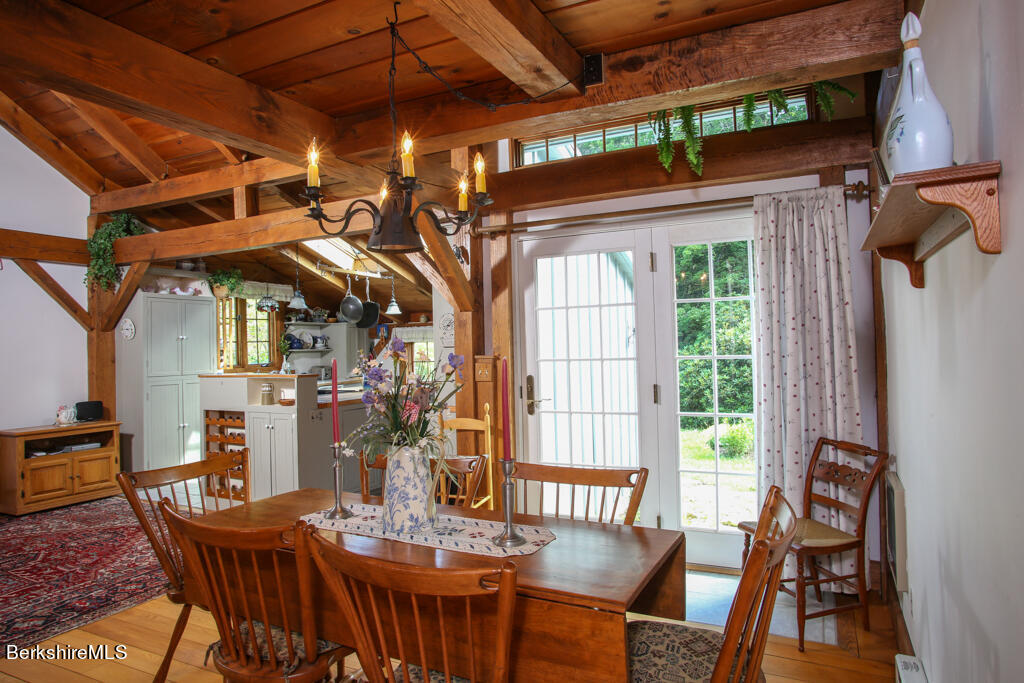 544 Tunnel Road Rowe, MA 01367 - Photo 18 of 32 a view of a dining room with furniture window and outside view
