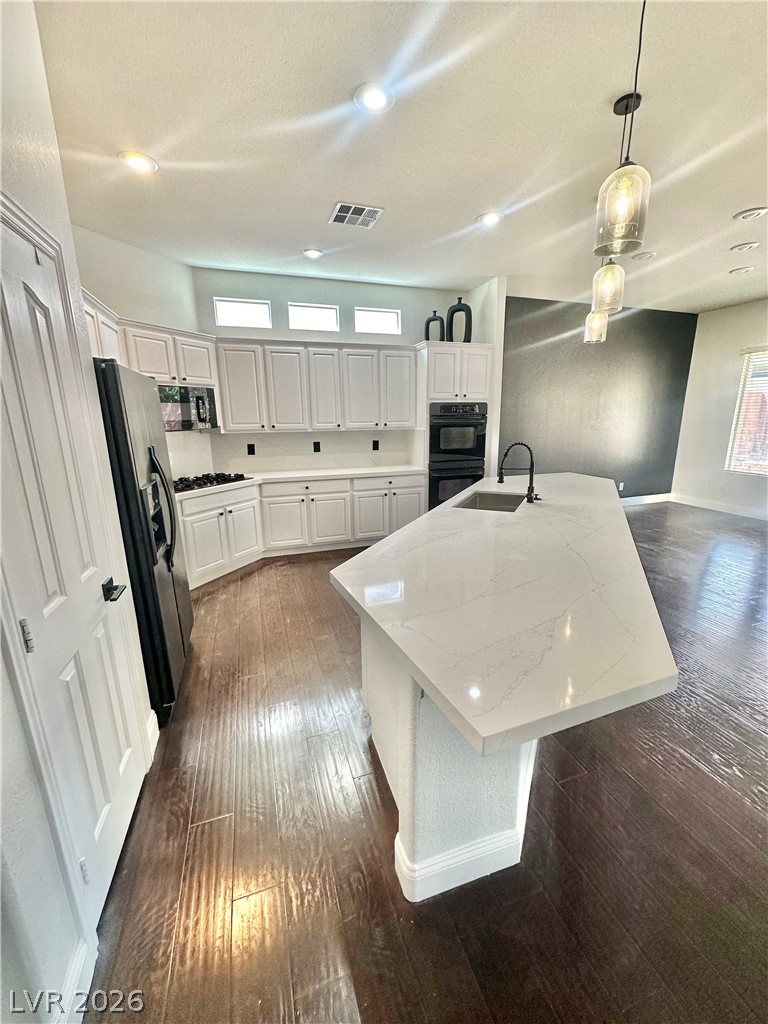 9996 Liberty View Road Las Vegas, NV 89148 - Photo 16 of 64 MODERN OPEN KITCHEN WITH ISLAND