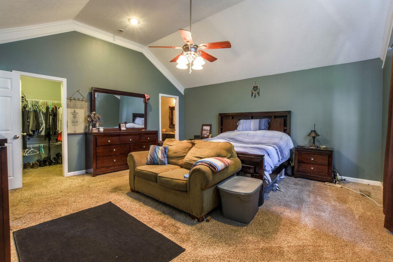 722 Lear Road Portland, TN 37148 - Photo 13 of 20 a bedroom with furniture and a large window