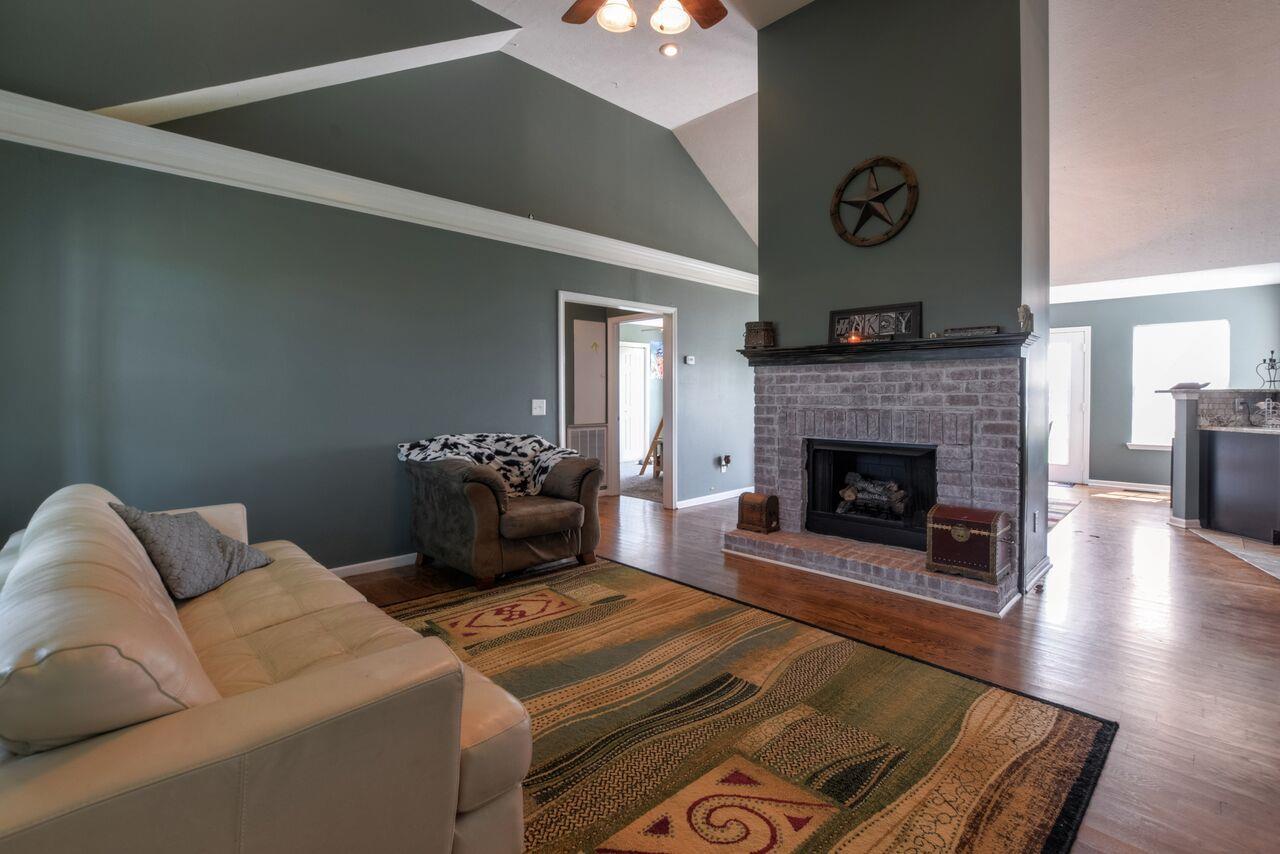 722 Lear Road Portland, TN 37148 - Photo 4 of 20 a living room with furniture and a fireplace