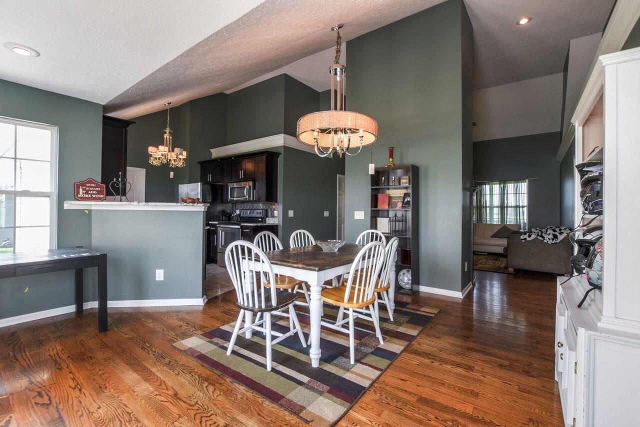 722 Lear Road Portland, TN 37148 - Photo 7 of 20 a view of a dining room with furniture and wooden floor