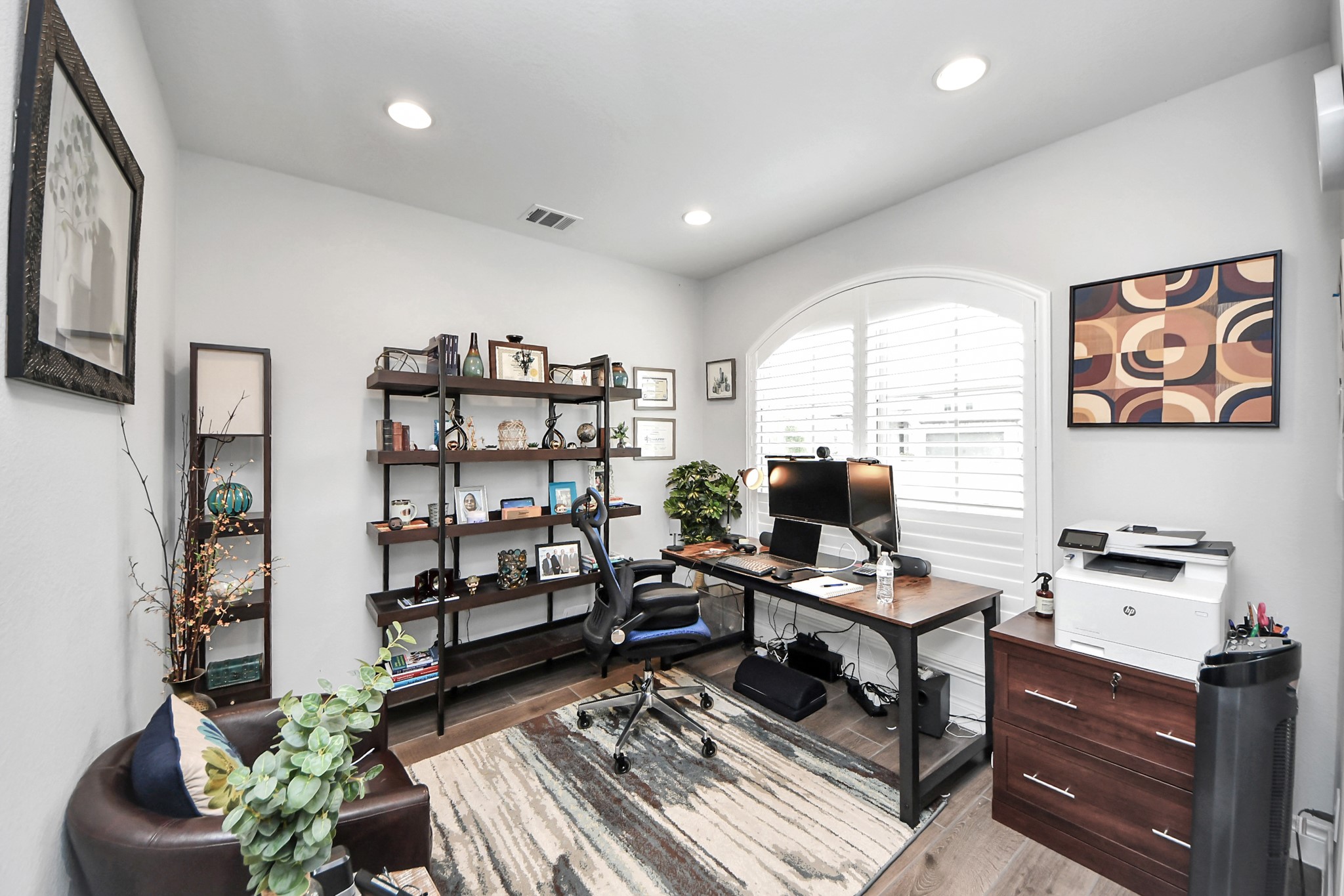 2242 Bayleaf Manor Drive Manvel, TX 77578 - Photo 12 of 48 a workspace with furniture and book shelf