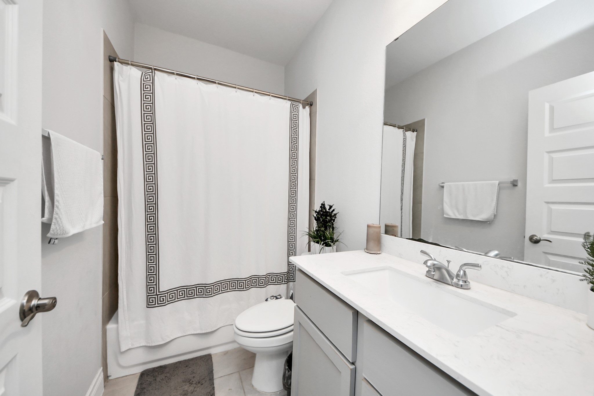 2242 Bayleaf Manor Drive Manvel, TX 77578 - Photo 12 of 50 a bathroom with a sink toilet and shower