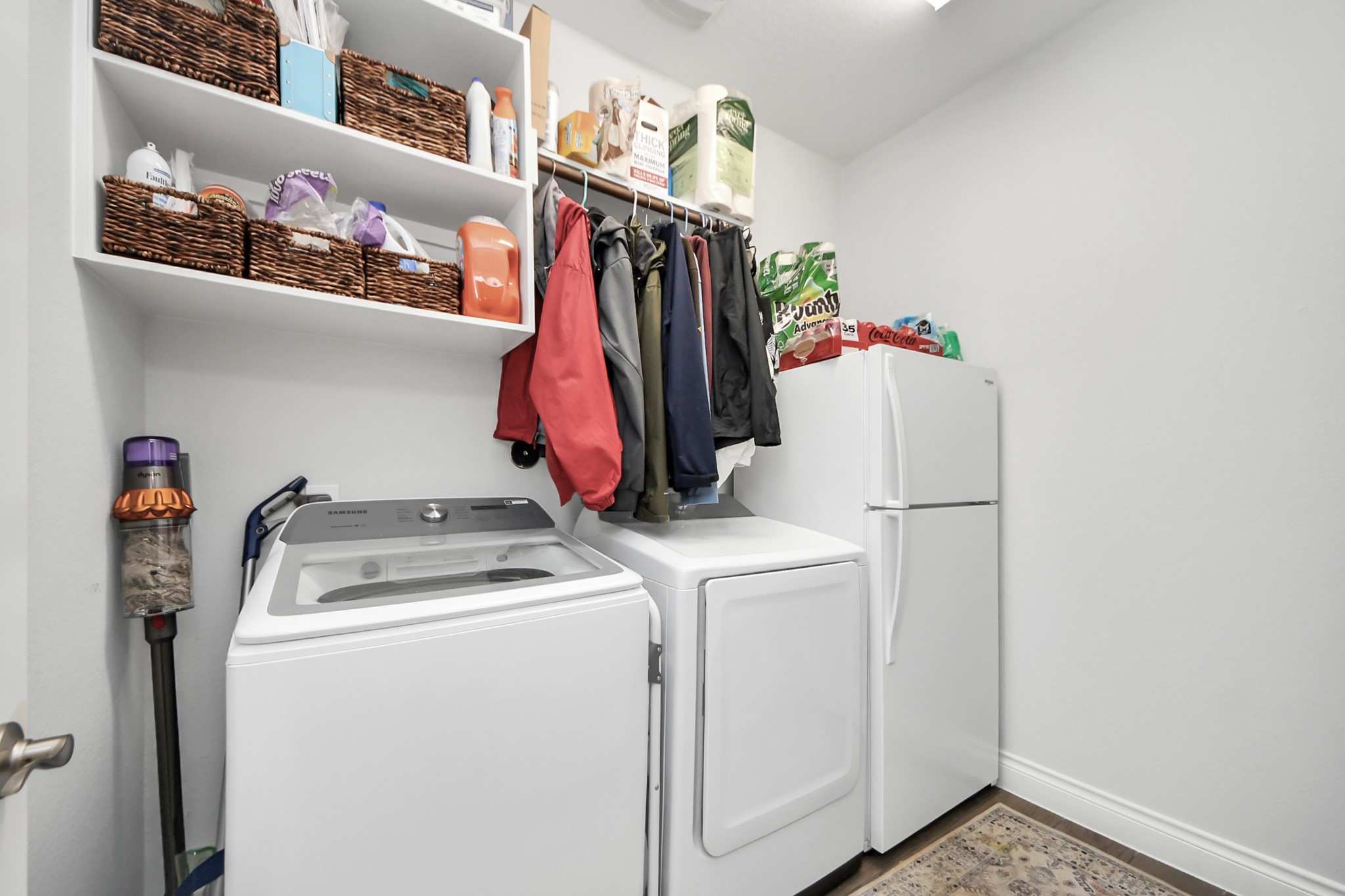 2242 Bayleaf Manor Drive Manvel, TX 77578 - Photo 17 of 48 a utility room with dryer and washer